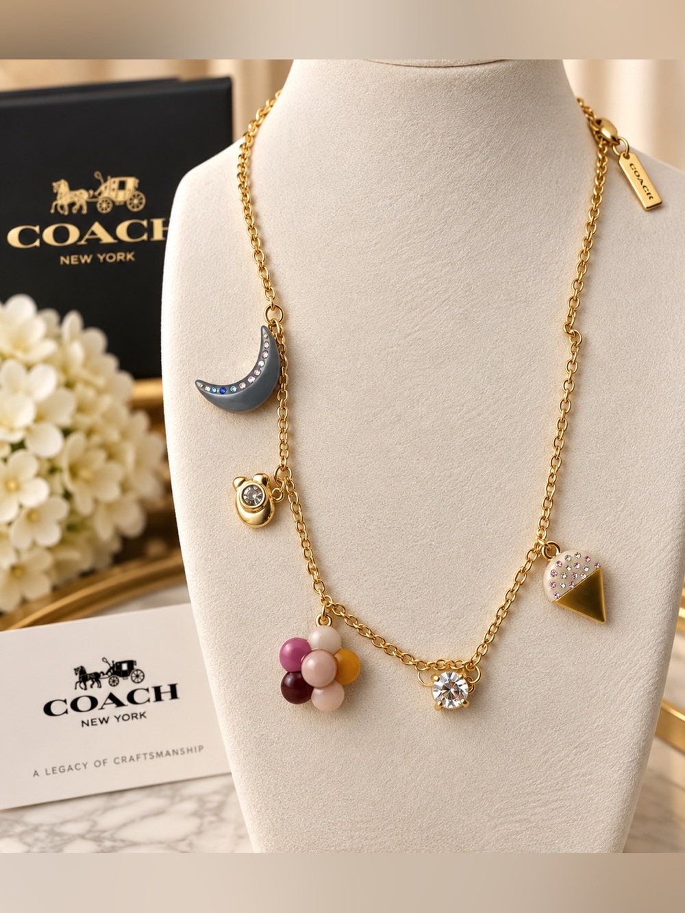 Coach Gold-Tone Charm Necklace with Pink, Purple, Yellow and Blue Accents